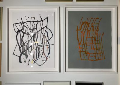 (2 works) ink on paper floating framed in white, by artist Lj.
